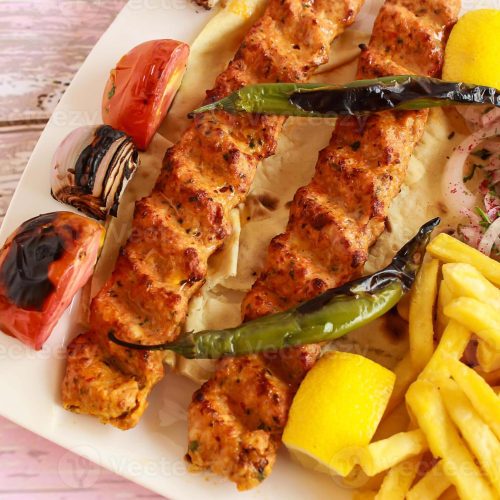 chicken-seekh-kabab-with-minced-meat-lemon-onion-and-french-fries-served-in-dish-isolated-wooden-table-top-view-of-tandoori-grill-bbq-food-photo (1) chicken-seekh-kabab-with-minced-meat-lemon-onion-and-french-fries-served-in-dish-isolated-wooden-table-top-view-of-tandoori-grill-bbq-food-photo (1)